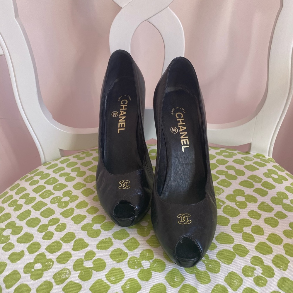 Black leather Chanel peep toe heels